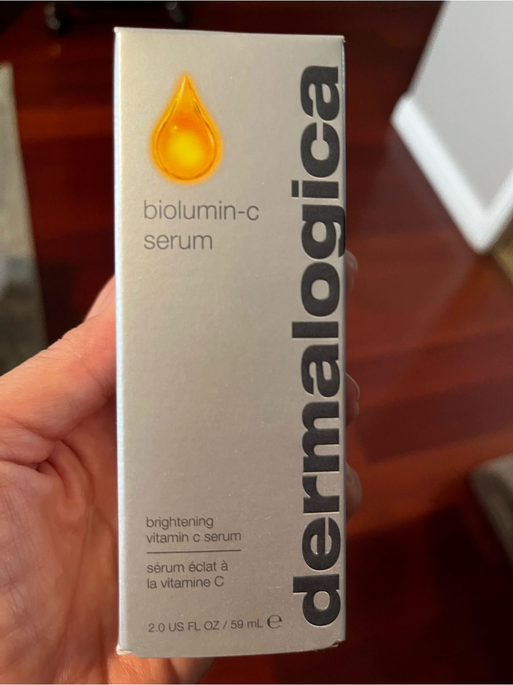dermalogica silver box with yellow droplet Biolumin-C Serum